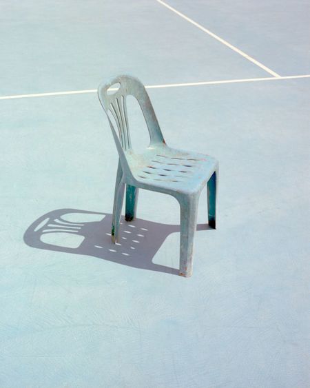 Empty chair at sports court 