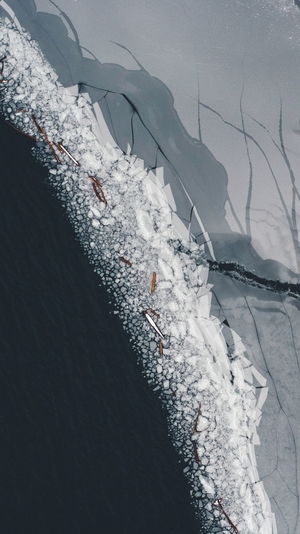 High angle view of snow in sea