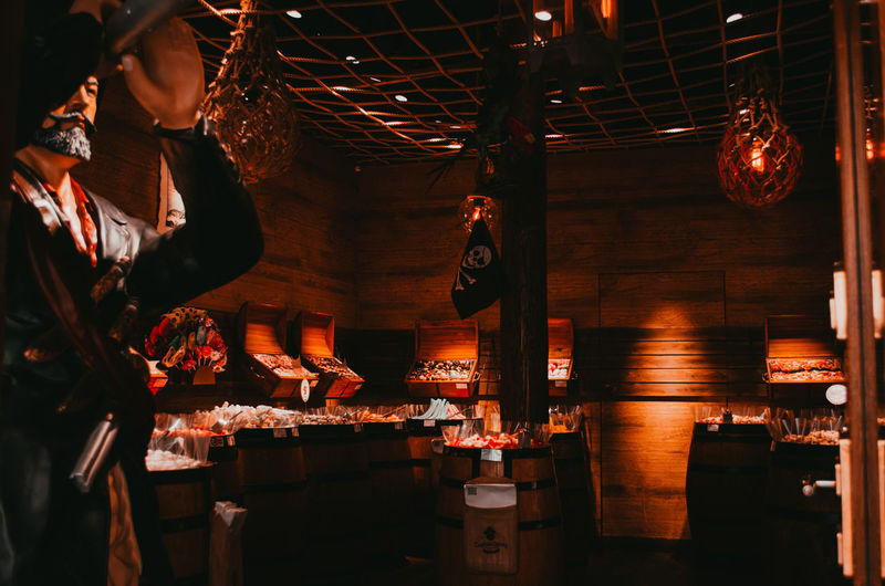 Low angle view of illuminated lanterns hanging in restaurant
