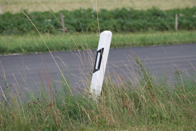 Close-up of road marker