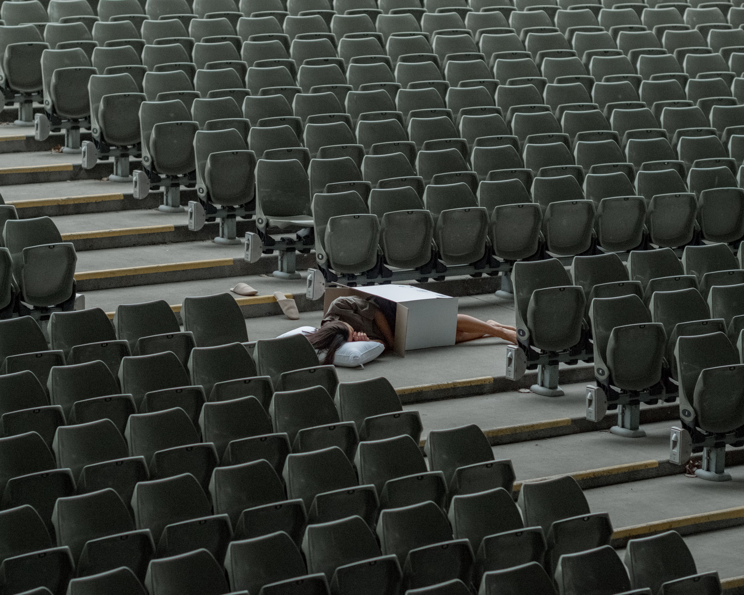 in a row, seat, indoors, large group of objects, repetition, no people, lecture hall, high angle view, school, chair, order, absence, auditorium, arrangement, abundance, arts culture and entertainment, university, technology, architecture