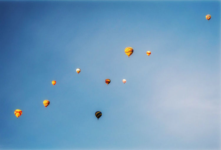 Low angle view of balloons in sky