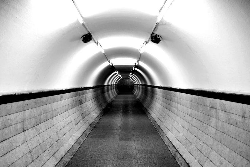 Illuminated tunnel at subway station