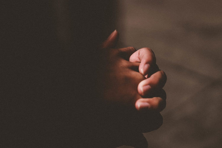 Close-up of hands in prayer