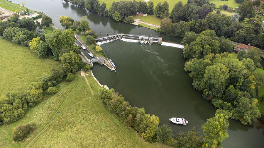 An aerial view of the weir on the river thames at mapledurham in oxfordshire, uk