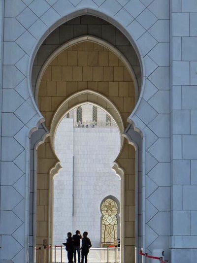 Men standing at sheikh zayed mosque