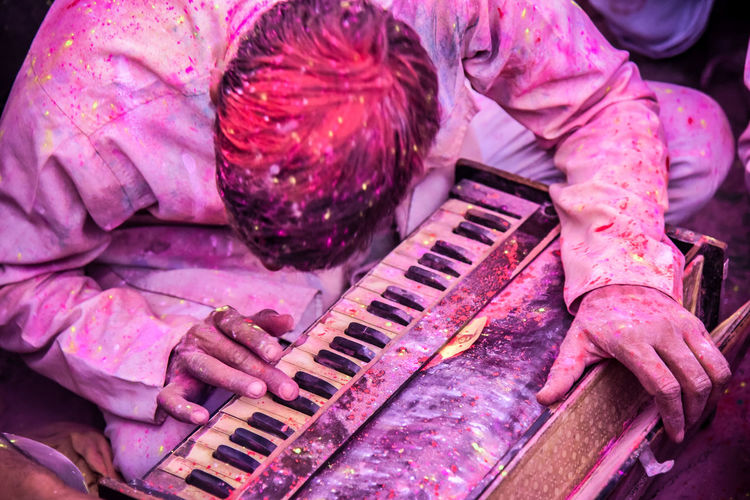 Close-up of man playing accordion