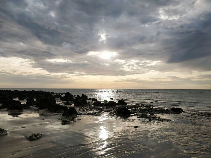 Scenic view of sea against sky during sunset