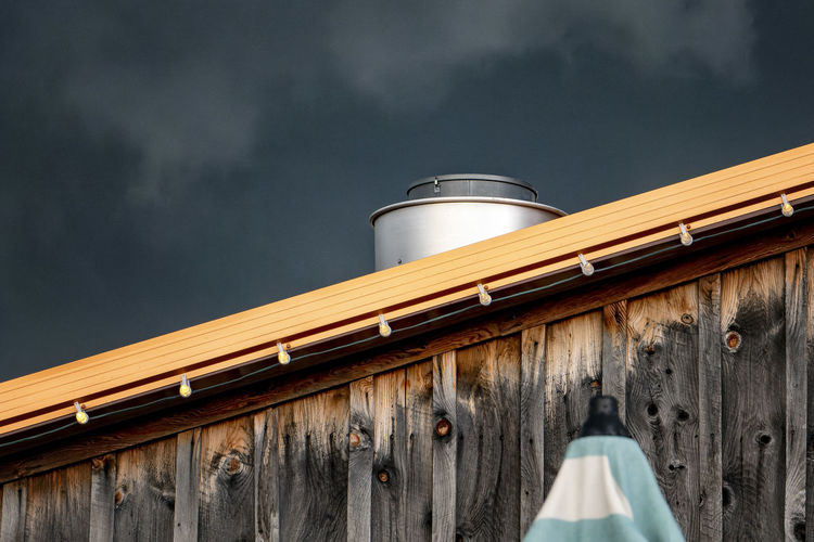 Stormy sky over a slanting roof
