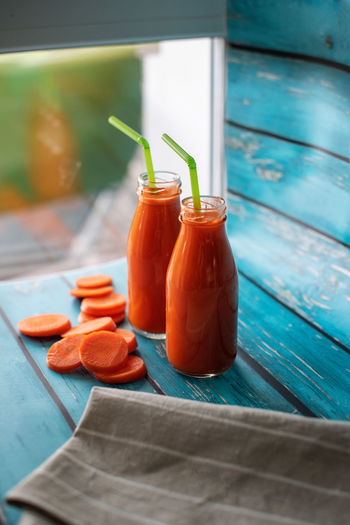 Close-up of juice in glass on table