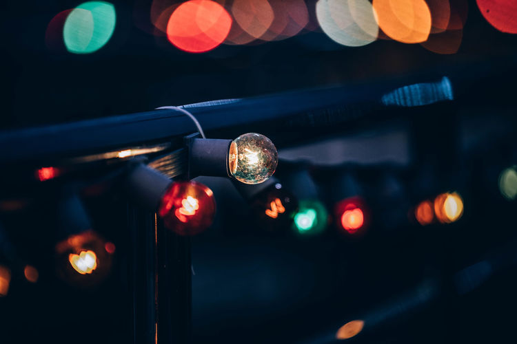 Close-up of illuminated lights at night