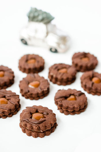 Close-up of cookies against white background
