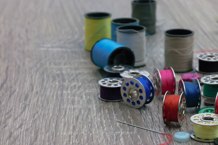 Close-up of sewing kit on table
