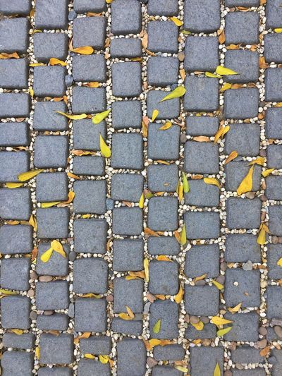 Full frame shot of yellow cobblestone street