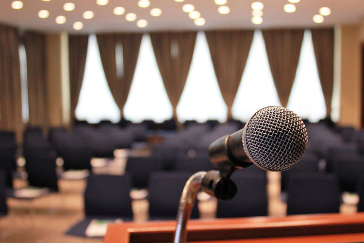 Close-up of microphone at auditorium