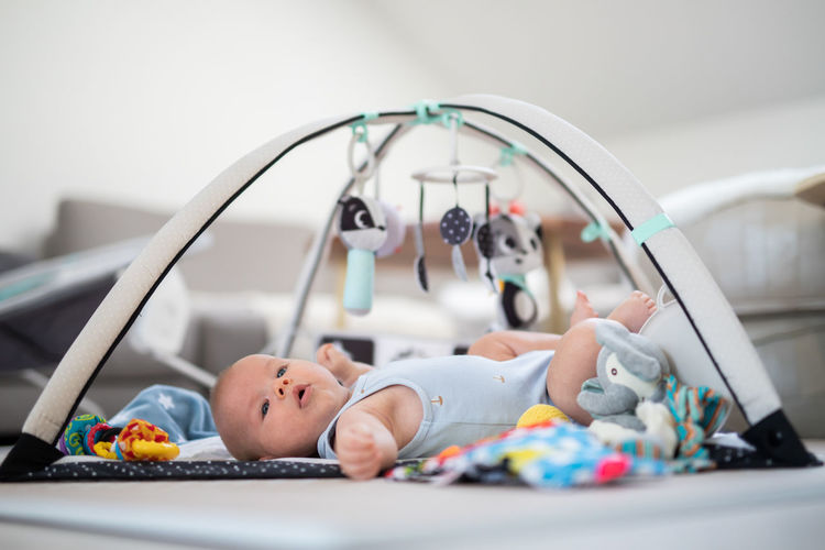 Portrait of cute baby boy in basket