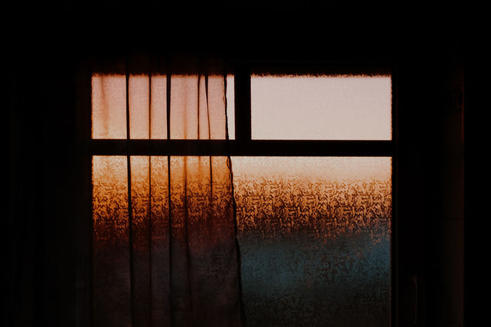 Glass window in house during sunset