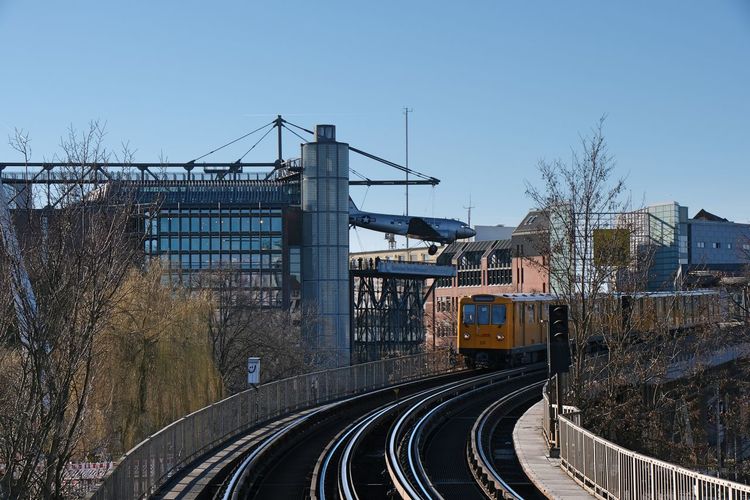 Railroad tracks against clear sky