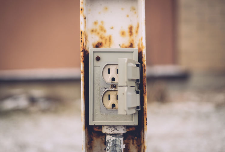 Close-up of rusty electric meter