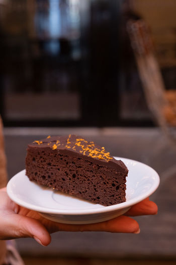 Slice of chocolate cake on a plate 