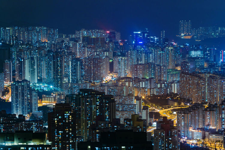 High angle view of illuminated city buildings