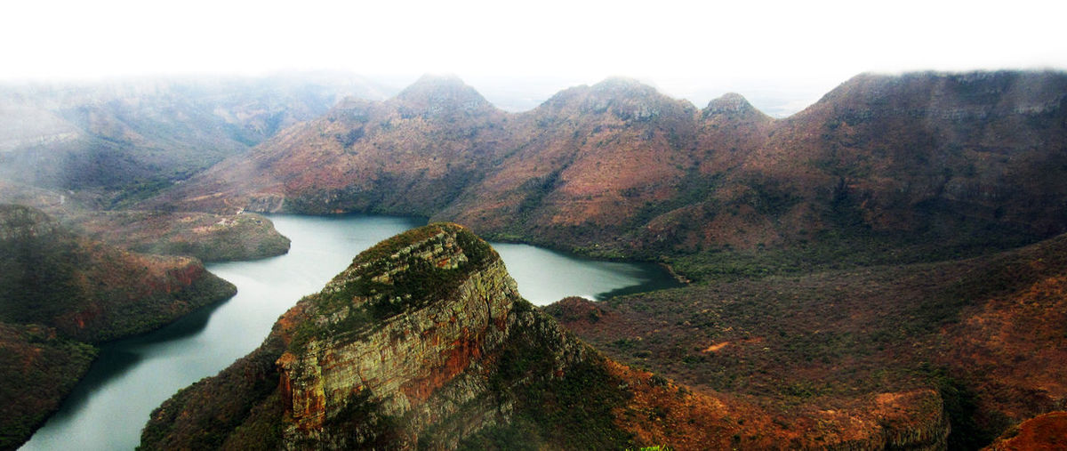 Close-up of lake against mountain