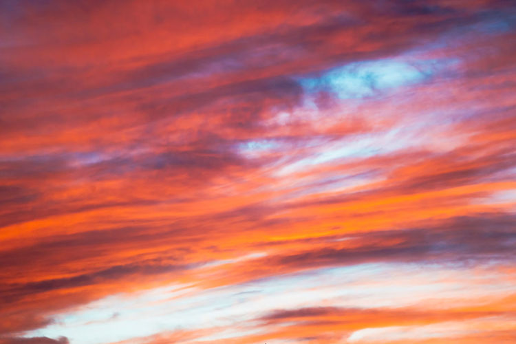 Low angle view of dramatic sky during sunset
