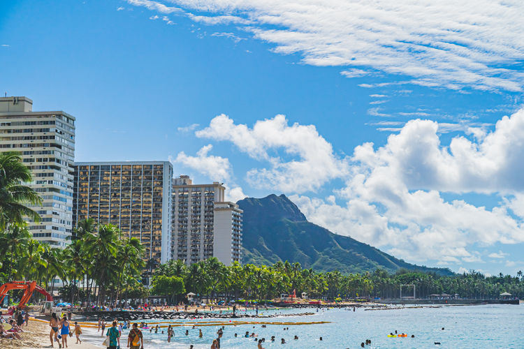 Oahu, hawaii november 15 2019 tourists enjoying waikiki beach with diamond head