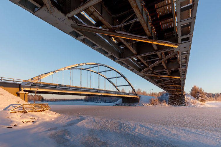 Bridge against clear sky during winter
