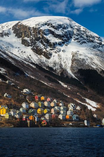 Scenic view of snowcapped mountain against sky during winter