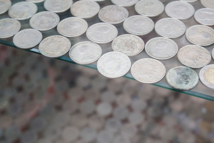 Close-up high angle view of coins