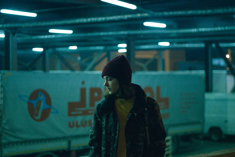 Woman standing at subway station