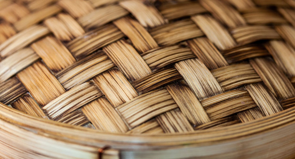 Close-up of a bamboo steamer pot.