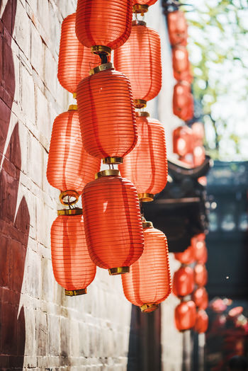 Low angle view of lanterns hanging outdoors
