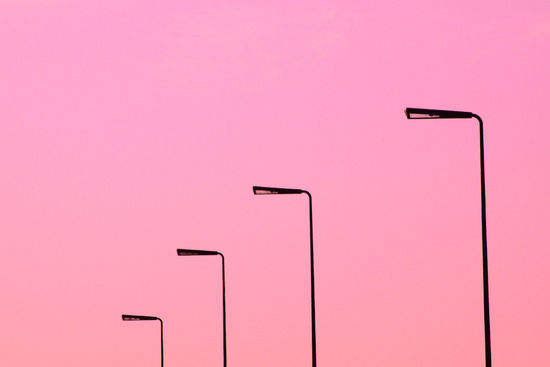 FULL FRAME SHOT OF STREET LIGHT AND PINK WALL