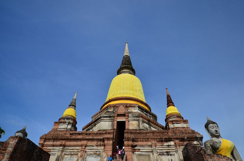 Low angle view of a building against blue sky