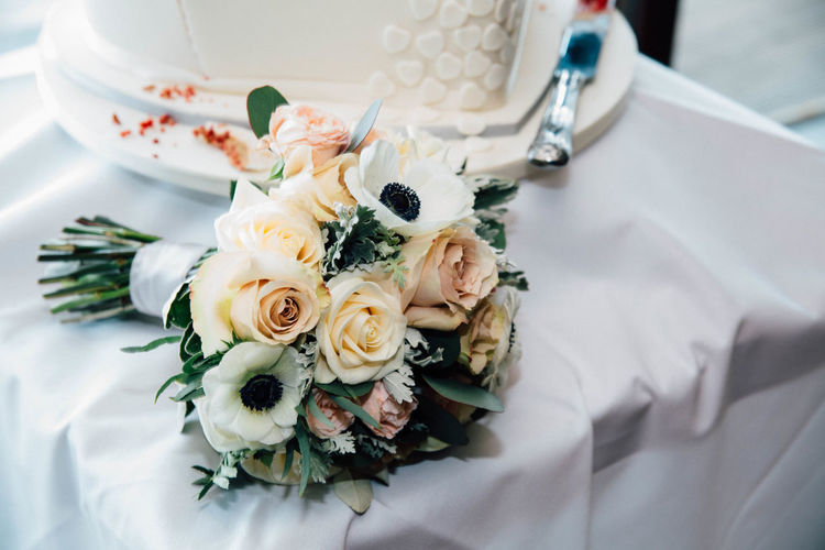 High angle view of rose bouquet on white table