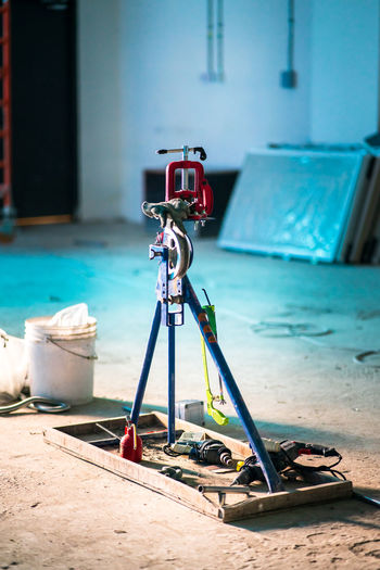 Manual mechanical steel iron metal wire bending device in a construction site.