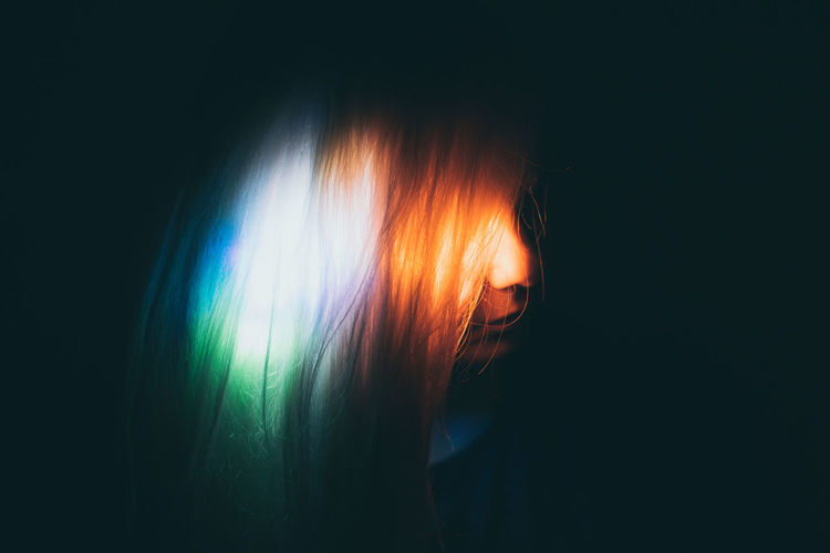 Adult Adults Only Black Background Close-up Headshot Illuminated Indoors Lifestyles Multi Colored One Person One Woman Only Only Women People Portrait Women EyeEm Ready AI Now Inner Power Visual Creativity Creative Space The Portraitist - 2018 EyeEm Awards Capture Tomorrow Humanity Meets Technology