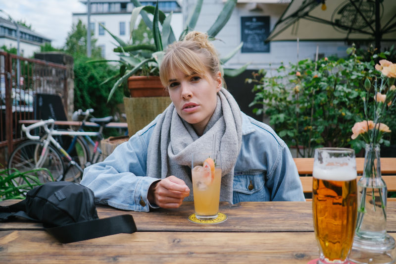 Portrait of woman sitting at restaurant