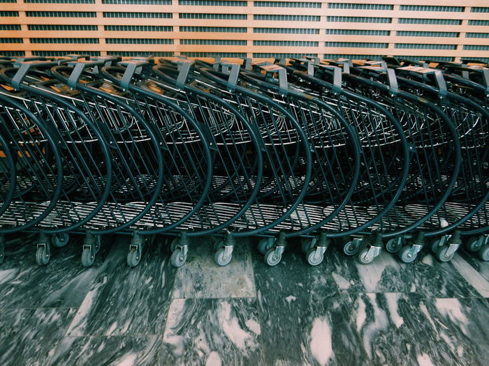 Shopping carts arranged on floor