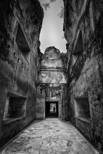 Narrow alley along buildings