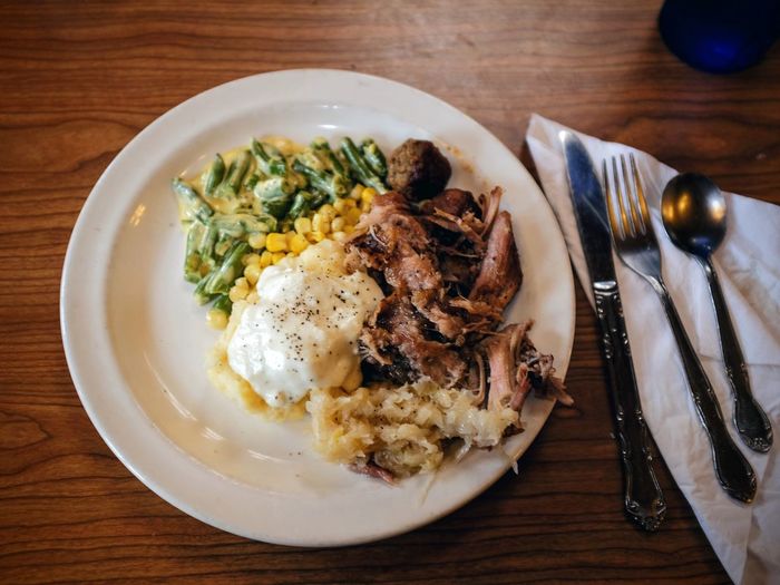 High angle view of fresh meal served on table
