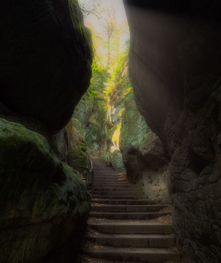 Staircase leading towards cave