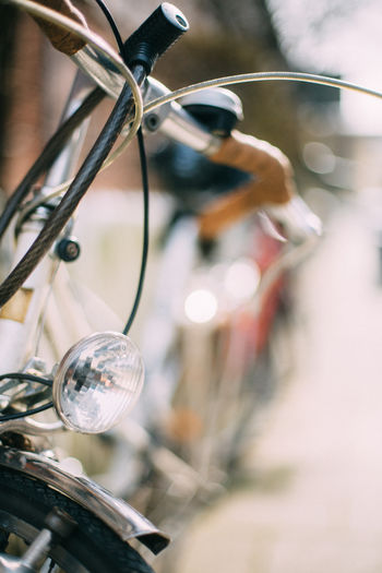 Close-up of headlight on bicycle