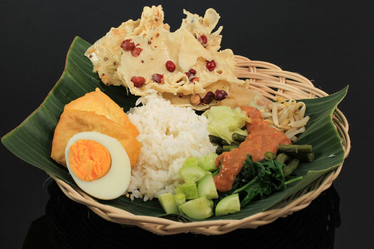 Pecel is a traditional food from east and central java, indonesia. made of a mixed 