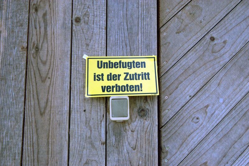 Information sign on wooden door