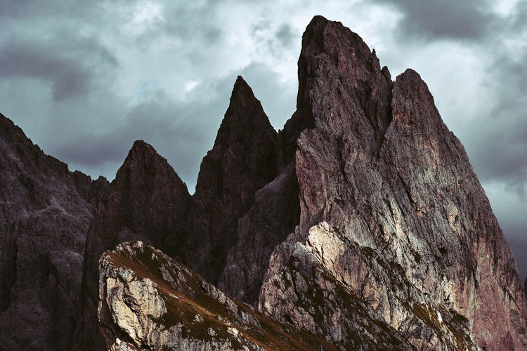 Low angle view of rock formation against sky