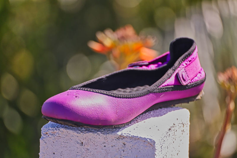 Close-up of purple shoes