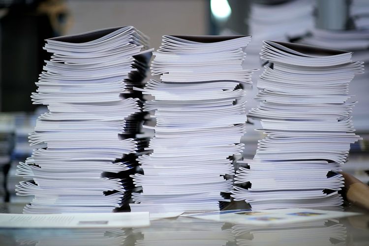Stack of papers on table